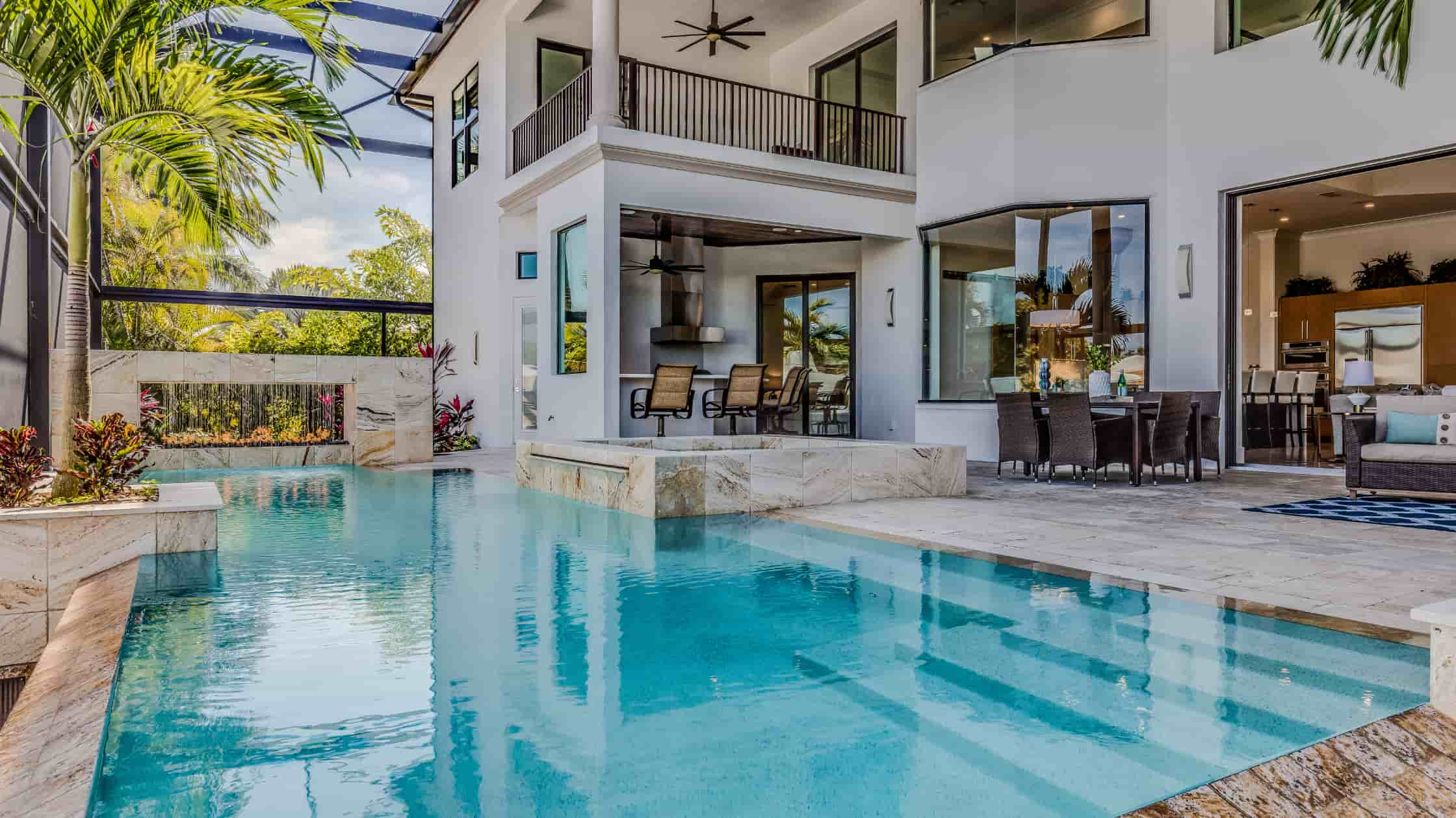 Outdoor pool behind house