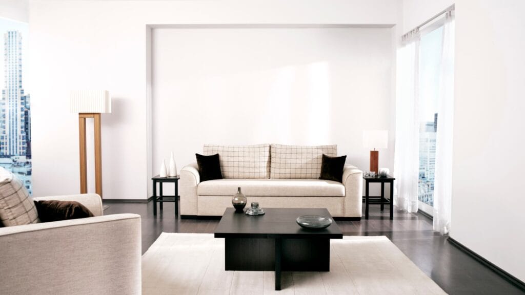 Minimalist home staging in Colorado showcasing modern white living room design for real estate appeal