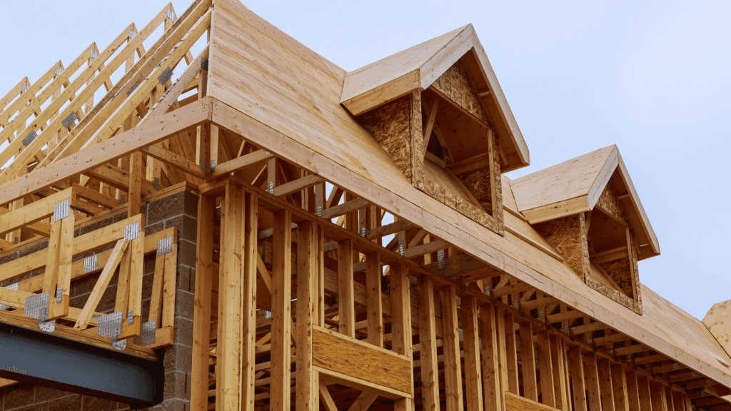 Wood framing and new dormers during home additions in Colorado.