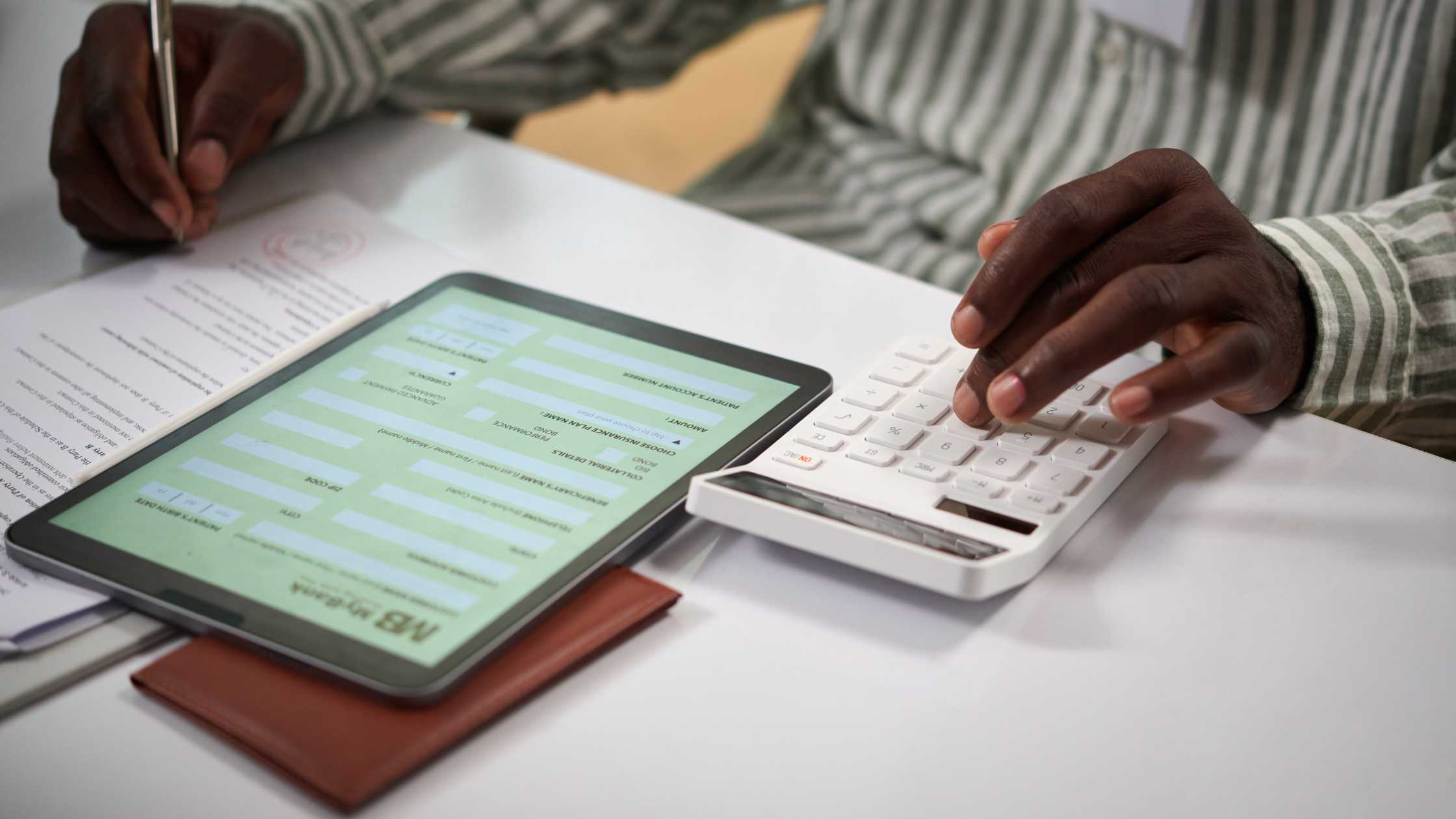 colorado down payment assistance application on tablet at closing