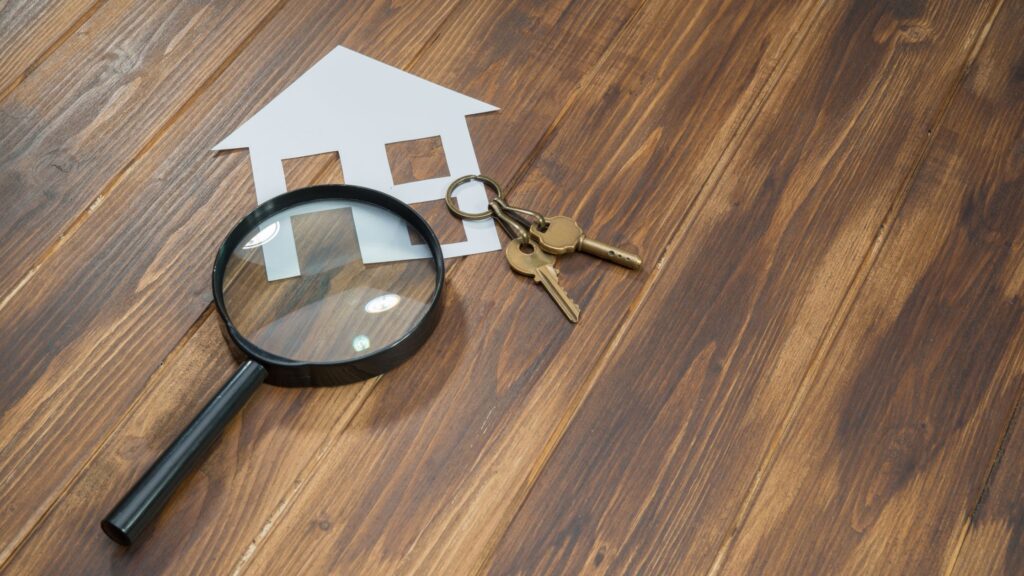 colorado hoa rules inspection with magnifying glass over house