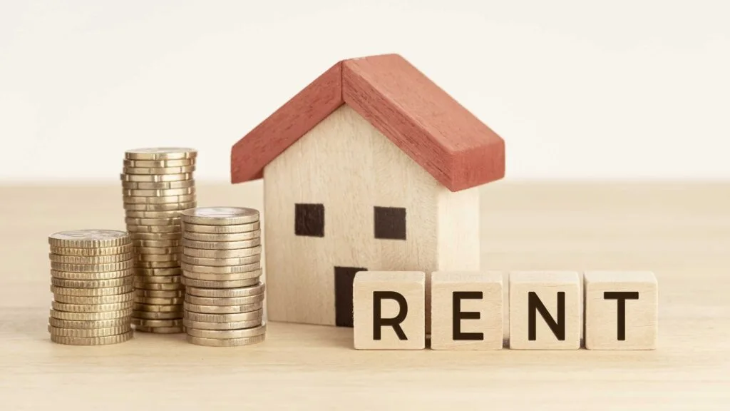 house hacking denver rent blocks with coins and house model