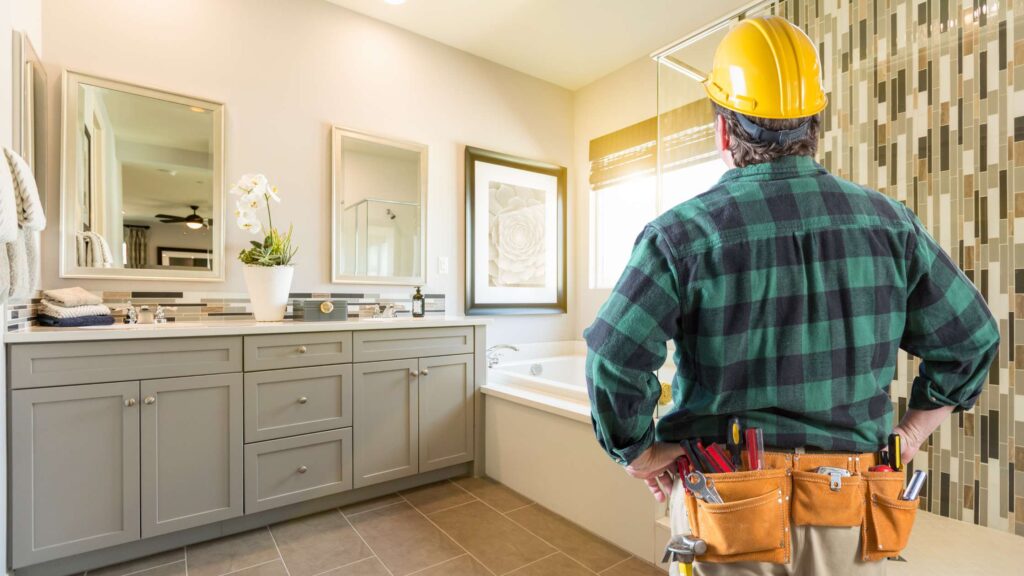 Modern bathroom remodeling project in Denver, Colorado featuring custom tile shower and double-sink vanity.
