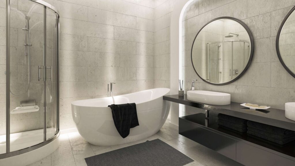 Luxury bathroom remodeling in Denver Colorado with freestanding tub, glass shower, and double vanity.