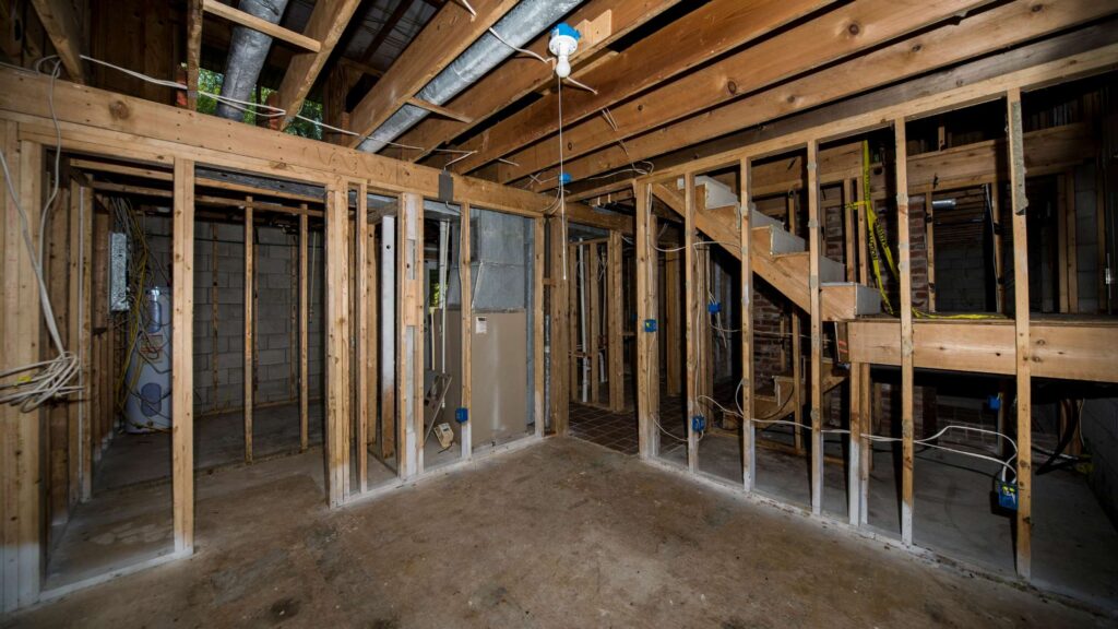 Basement framing and electrical installation during Colorado basement finishing project.