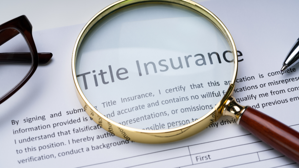 Magnifying glass over a title insurance document representing title insurance Colorado public record search and policy review.